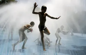 Season Prints: Print of boys cooling off in a public fountain on a hot summer day