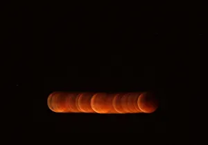 The shadow of the earth falls on the moon during a total lunar eclipse in Malaga The shadow of the earth falls on the moon during a total lunar eclipse in Malaga