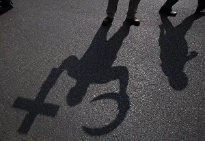 The shadows of a Cross and a Crescent are cast by an anti-Mursi The shadows of a Cross and a Crescent are cast by an anti-Mursi