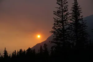 Smoke creates a red hazy sunset from the Swan Lake Fire on the Kenai Peninsula, in Seward Smoke creates a red hazy sunset from the Swan Lake Fire on the Kenai Peninsula, in Seward