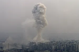 Smoke rises after airstrikes on rebel-controlled besieged eastern Aleppo Smoke rises after airstrikes on rebel-controlled besieged eastern Aleppo