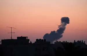 Smoke rises following an Israeli air strike in the central Gaza Strip Smoke rises following an Israeli air strike in the central Gaza Strip