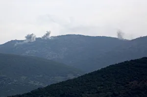 Smoke rises on the mountains as seen from Northern Afrin countryside Smoke rises on the mountains as seen from Northern Afrin countryside
