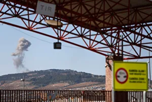 Smoke rises from the Syrian side as seen from the Oncupinar border gate on the Smoke rises from the Syrian side as seen from the Oncupinar border gate on the