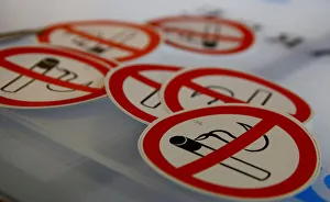 No smoking signs are seen on a table in the Karas printing shop in Vienna No smoking signs are seen on a table in the Karas printing shop in Vienna