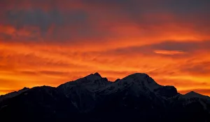 The snow covered mountain summits of Serles mountain and Mutterer Alm mountain are seen The snow covered mountain summits of Serles mountain and Mutterer Alm mountain are seen