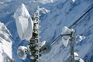 Snow covered transmitting antennas are pictured on top of the highest German mountain Snow covered transmitting antennas are pictured on top of the highest German mountain