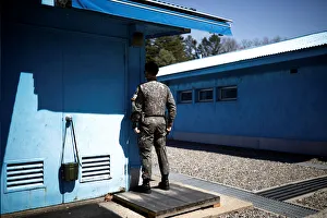 A South Korean soldier stands guard at the truce village of Panmunjom A South Korean soldier stands guard at the truce village of Panmunjom