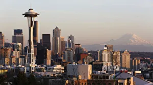 The Space Needle and Mount Rainier are pictured at dusk in Seattle, Washington The Space Needle and Mount Rainier are pictured at dusk in Seattle, Washington