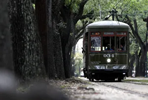 A Street Car travels down St. Charles Ave. in New Orleans A Street Car travels down St. Charles Ave. in New Orleans