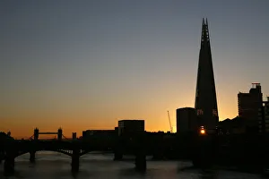 The sun is seen through a window of the Shard building during sunrise in central London The sun is seen through a window of the Shard building during sunrise in central London