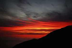 The sun sets over the Pacific Ocean in Point Mugu State Park The sun sets over the Pacific Ocean in Point Mugu State Park