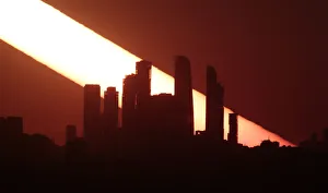 The sun sets behind the skyscrapers of the Moscow International Business Centre in Moscow The sun sets behind the skyscrapers of the Moscow International Business Centre in Moscow