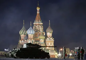 A T-34 Soviet-made tank and Russian servicemen take part in a rehearsal for a military A T-34 Soviet-made tank and Russian servicemen take part in a rehearsal for a military