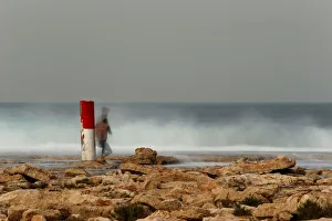 A tourist takes pictures of breaking waves at Ghallis outside Naxxar A tourist takes pictures of breaking waves at Ghallis outside Naxxar