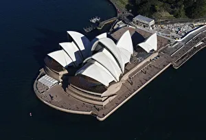 Tourist visit the Sydney Opera House on a sunny winter afternoon in Sydney Tourist visit the Sydney Opera House on a sunny winter afternoon in Sydney