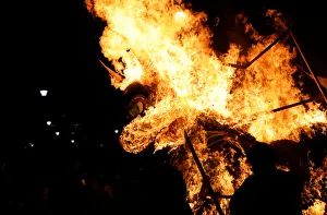 Traditional bull figure known as El Torito burns after exploding with fireworks in Traditional bull figure known as El Torito burns after exploding with fireworks in