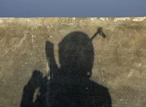 Turkey-backed Free Syrian Army fighters shadow is seen on a wall in the eastern suburbs Turkey-backed Free Syrian Army fighters shadow is seen on a wall in the eastern suburbs