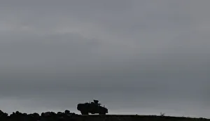 A Turkish armoured vehicle is driven along the Turkish-Syrian border in Hatay province A Turkish armoured vehicle is driven along the Turkish-Syrian border in Hatay province