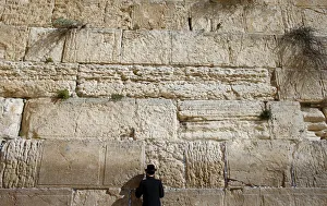 An ultra-Orthodox Jewish man prays in front of the Western Wall in Jerusalems Old City An ultra-Orthodox Jewish man prays in front of the Western Wall in Jerusalems Old City