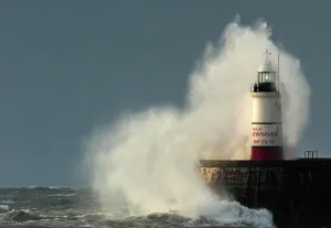 East Sussex Prints: Large waves crash against Newhaven seawall in a print