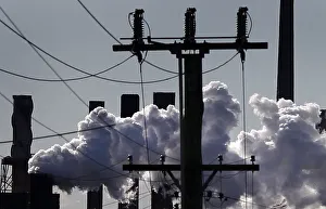 Vapour pours from a steel mill chimney in the industrial town of Port Kembla Vapour pours from a steel mill chimney in the industrial town of Port Kembla