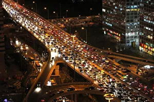 Vehicles drive on Three Ring Road in central Beijing Vehicles drive on Three Ring Road in central Beijing