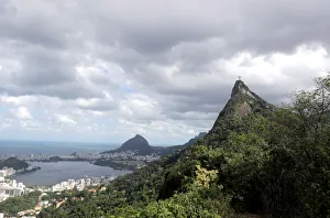 A view shows the Redeeming Christ statue atop Corcovado Mountain and the Rodrigo de A view shows the Redeeming Christ statue atop Corcovado Mountain and the Rodrigo de