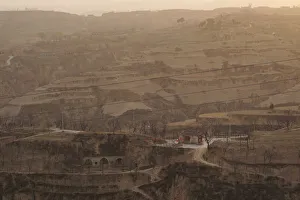 A village with subterranean houses, that locals refer to as caves A village with subterranean houses, that locals refer to as caves