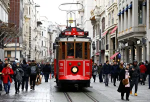 A vintage tram runs along the main shopping and pedestrian street of Istiklal in central A vintage tram runs along the main shopping and pedestrian street of Istiklal in central