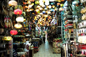 A visitor looks at traditional light-shop in local souq at Bab al Bahrain in Manama A visitor looks at traditional light-shop in local souq at Bab al Bahrain in Manama
