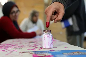 A voters finger is marked with ink at a polling station during the second day of the A voters finger is marked with ink at a polling station during the second day of the