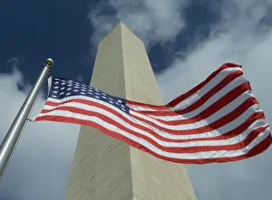 WASHINGTON MONUMENT WITH AMERICAN FLAG WASHINGTON MONUMENT WITH AMERICAN FLAG