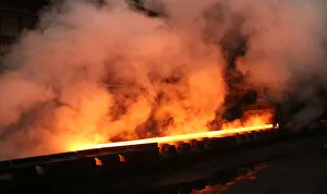Water runs off a steel coil as it is unrolled on the line at the Novolipetsk Steel PAO Water runs off a steel coil as it is unrolled on the line at the Novolipetsk Steel PAO