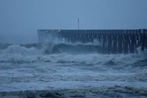 Waves crash along a pier as Hurricane Michael approaches Panama City Beach Waves crash along a pier as Hurricane Michael approaches Panama City Beach