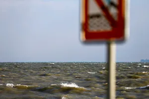 Waves are seeing on the Lake of Geneva during a windy day in Geneva Waves are seeing on the Lake of Geneva during a windy day in Geneva