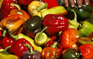 A woman sells peppers at a market in Santa Monica A woman sells peppers at a market in Santa Monica