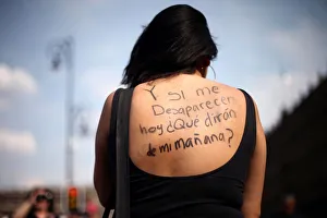 A woman takes part in a demonstration demanding justice for the female victims of A woman takes part in a demonstration demanding justice for the female victims of