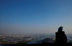 A women enjoys a sunny winter day on Leopoldsberg in Vienna A women enjoys a sunny winter day on Leopoldsberg in Vienna