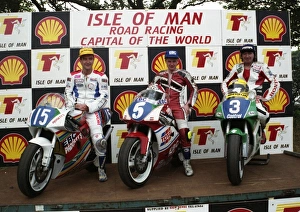 Jim Moodie (2nd) winner Brian Reid and 3rd placeman Joey Dunlop 1993 Junior TT Jim Moodie (2nd) winner Brian Reid and 3rd placeman Joey Dunlop 1993 Junior TT