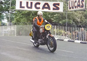 Mike Kelly (Triumph Travelling marshal) 1971 Manx Grand Prix Mike Kelly (Triumph Travelling marshal) 1971 Manx Grand Prix