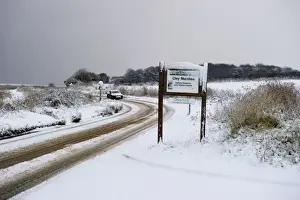 Snow-Covered A149 Coast Road Print
