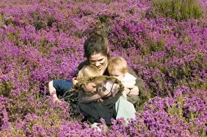 Images Dated 9th July 2006: Mother and kids on heath in summer Norfolk UK