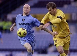 Images Dated 1st December 2001: A Battle of Football Greats: Lee Hughes vs Kenny Cunningham in Coventry City vs Wimbledon