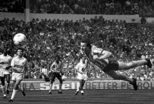 Coventry City striker Keith Houchen scores with a diving header to level the score 2-2 Coventry City striker Keith Houchen scores with a diving header to level the score 2-2