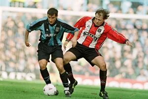 Images Dated 7th March 1998: Coventry City vs Sheffield United: A FA Cup Quarterfinal Showdown - Viorel Moldovan vs Lee Sandford