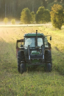 Agricultural Field Work Prints: John Deere tractor pulling muck spreader