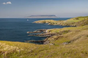 Scottish Coastal Views Prints: View of coastline and distant island