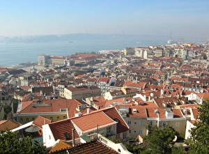 Tagus River Views Prints: View across city rooftops from castle towards river
