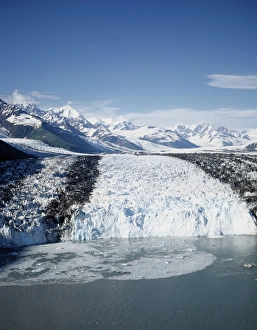 Aerial view or Harvard Glacier flowing out of the Chugach Mountains into College Aerial view or Harvard Glacier flowing out of the Chugach Mountains into College
